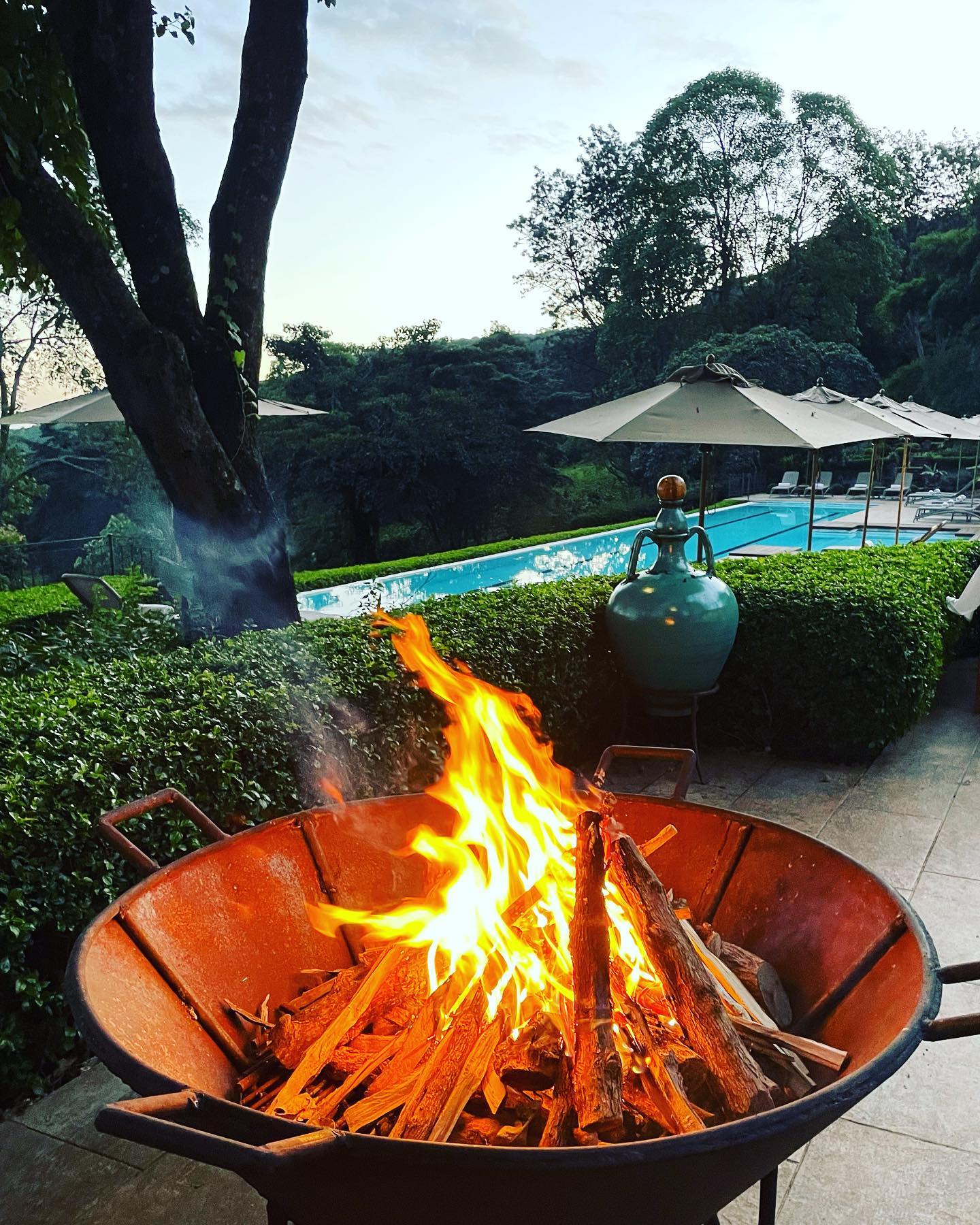 Fireside sundowners #autumnvibes #choir #stories #g&t #sundowner #fire #views