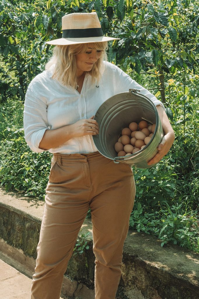 Woman earns her keep by collecting farm fresh eggs