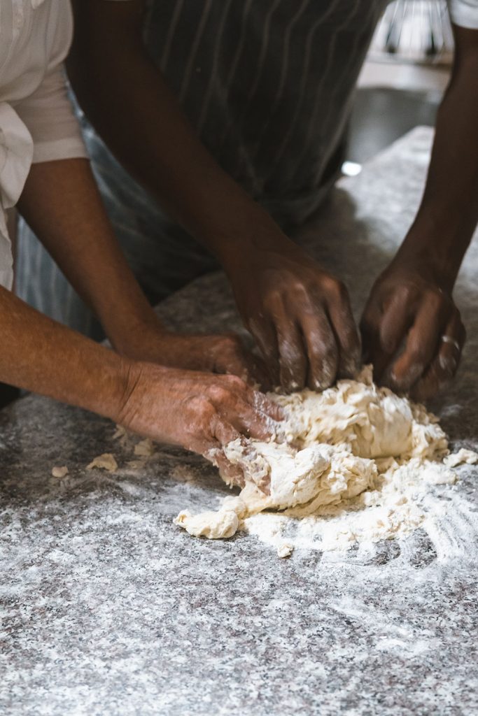 Earn your keep by kneading bread in the kitchen